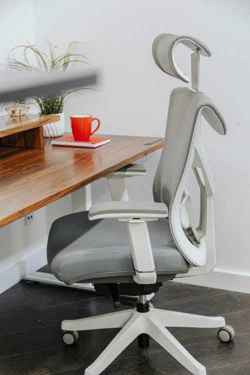 Modern ergonomic office chair at a desk